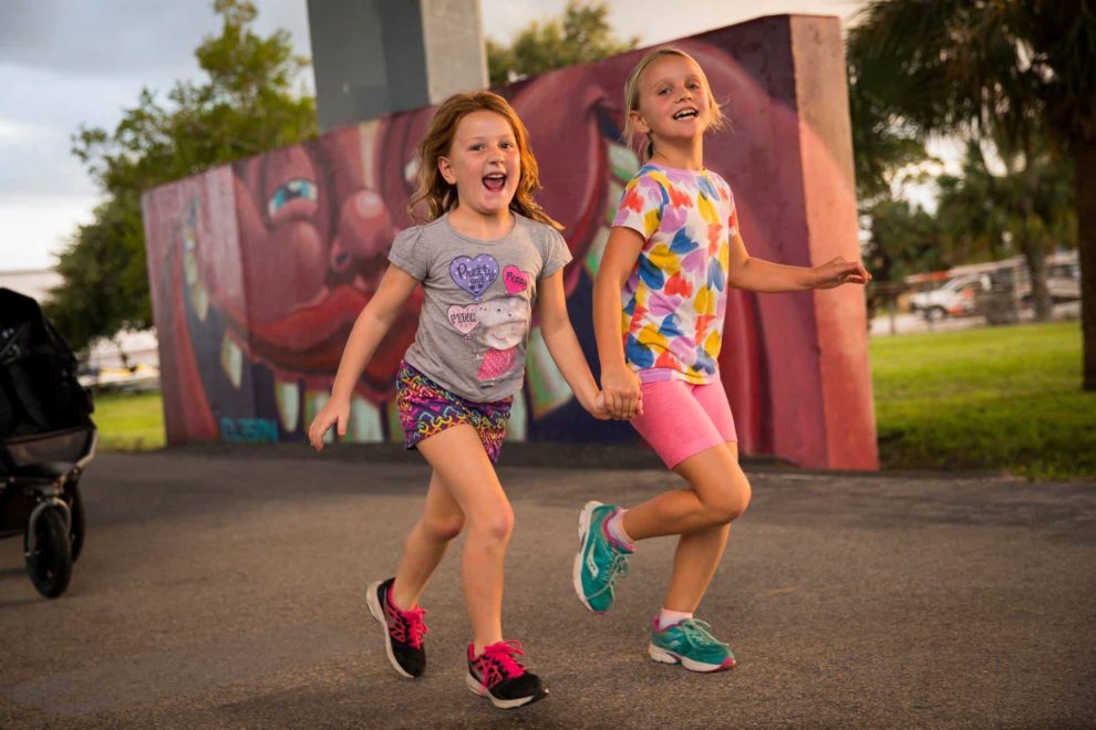 girls running together