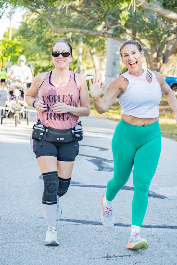 two ladies running together