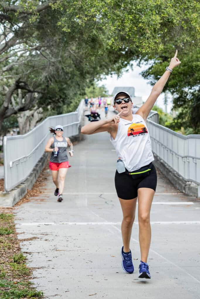 girl running on bridge