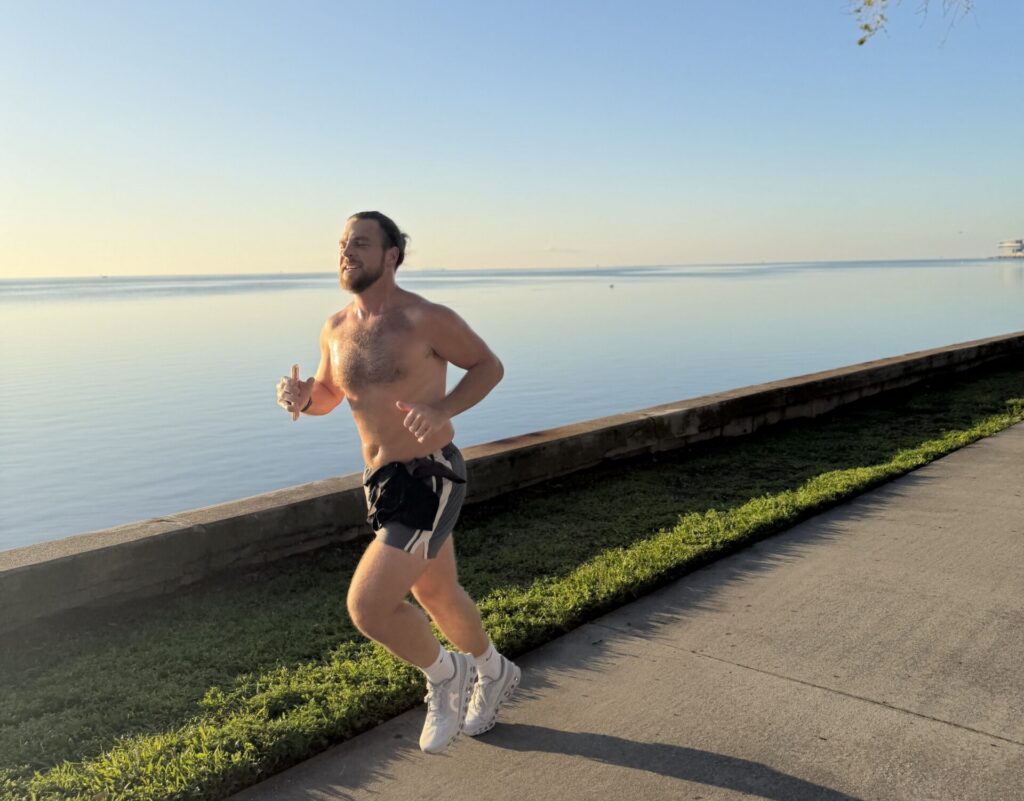 man running on beach