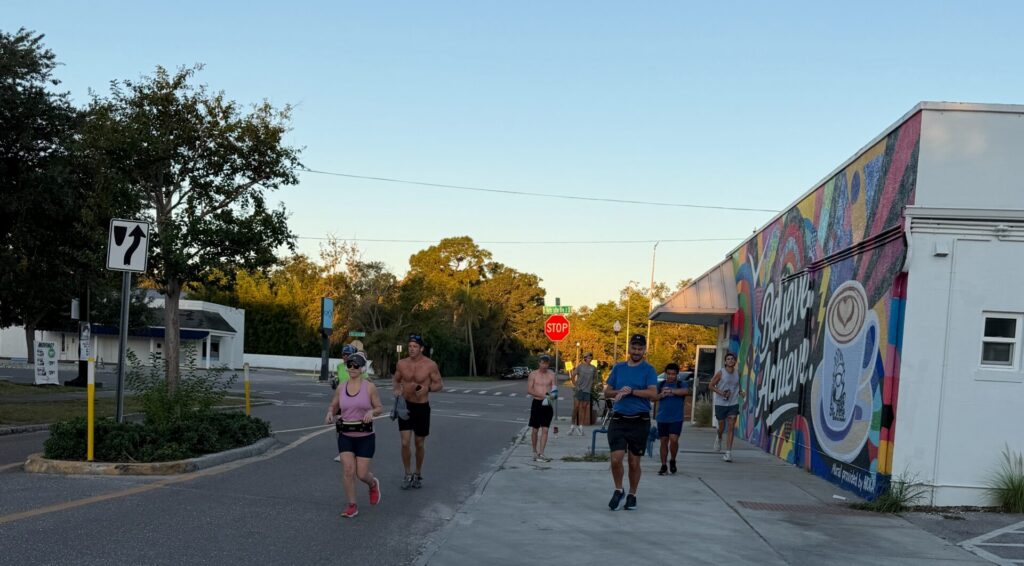 group running near the coffee store